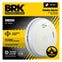 Battery powered, low profile, smoke alarm with replaceable battery and silence feature